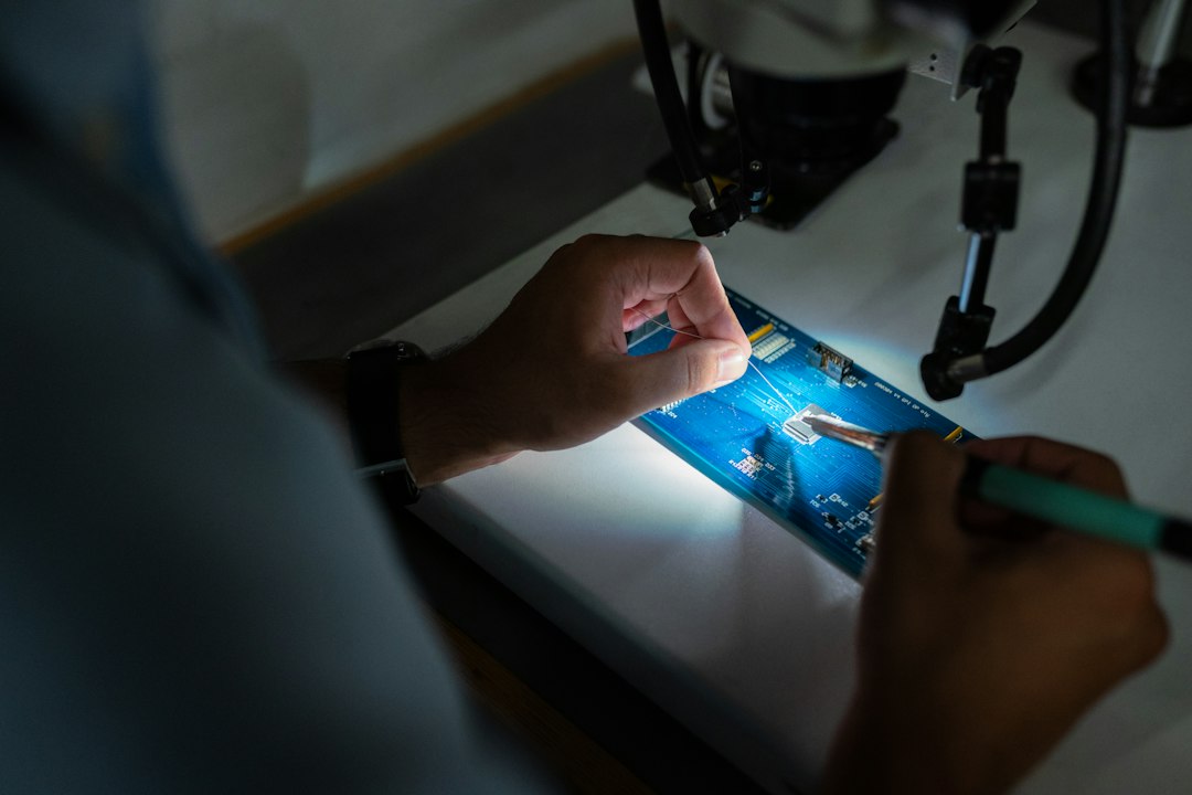 Electronic circuit inspection by an engineer at a laboratory bench