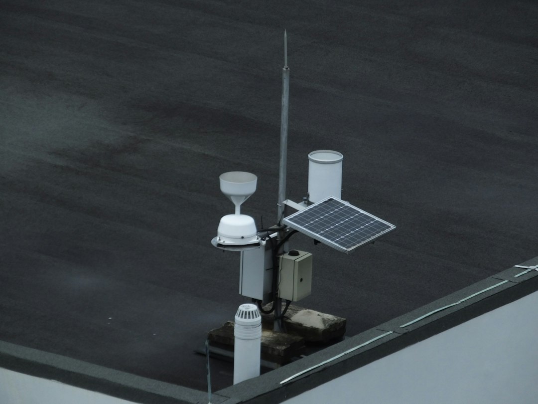 Outdoor environmental monitoring weather station with solar power and industrial data logger